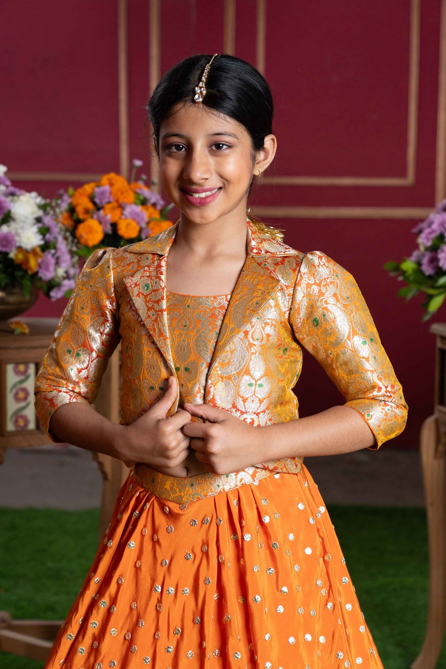 Orange Brocade Jacket Style Top And Lehenga Set For Girls