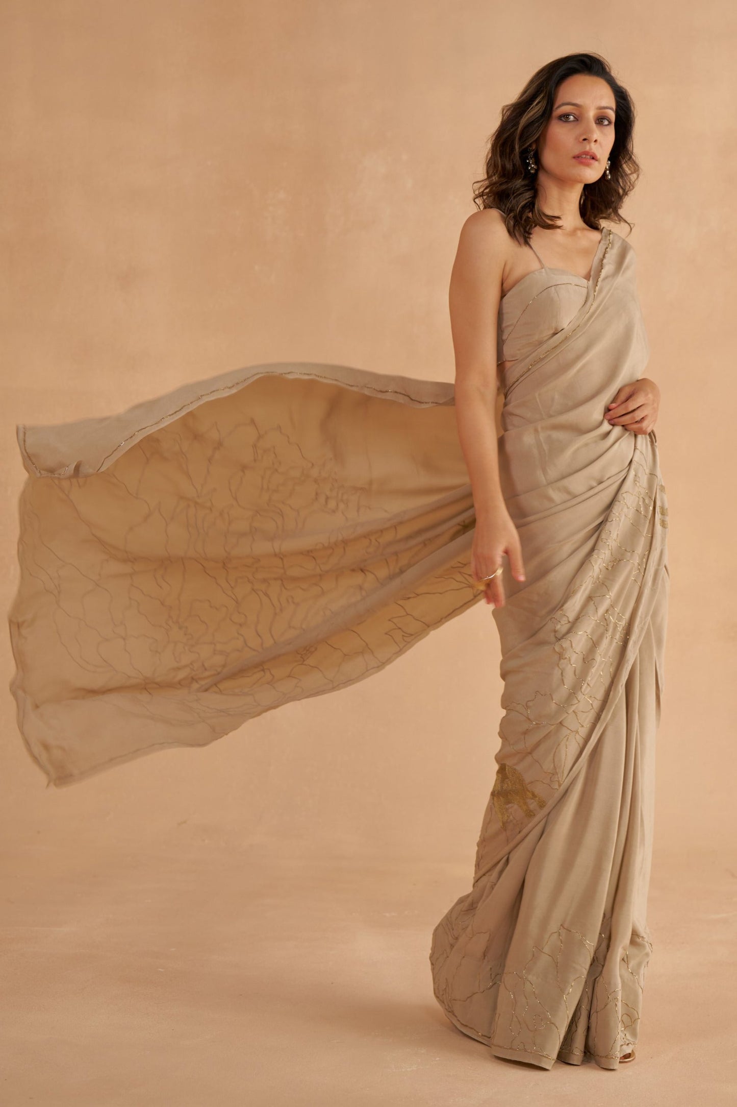 Warm Grey Crepe Silk Saree with Zardozi Embroidery and Strappy Embroidered Blouse
