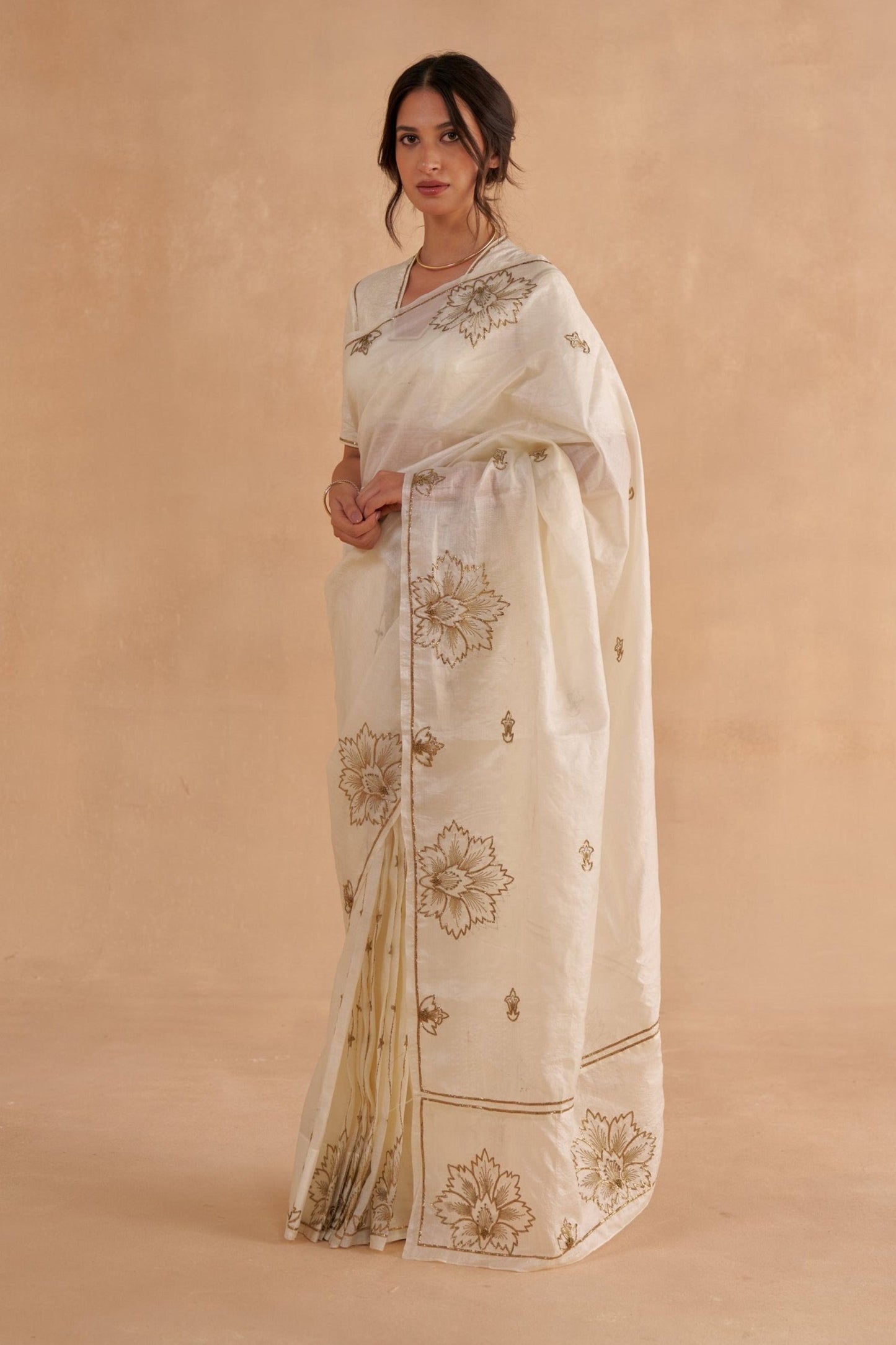 Vintage Ivory Tussar Saree with Gold Zardozi Embroidery and Paper Tussar blouse with Zari Embroidery