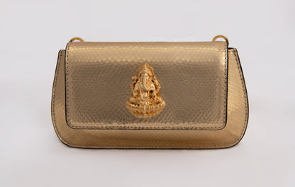 Radiant Gold Haridra Ganpati Carved Clutch