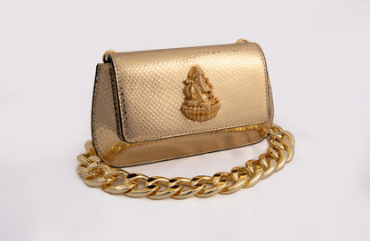 Radiant Gold Haridra Ganpati Carved Clutch