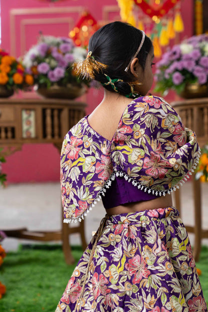 Elegant Embroidered Lehenga with Attached Floral Cape and Matching Potli Bag – Perfect for Weddings, Festivals, and Grand Celebrations