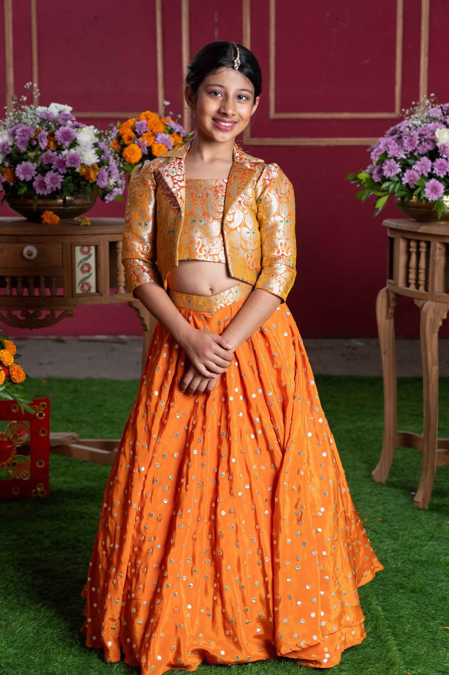 Orange Brocade Jacket Style Top And Lehenga