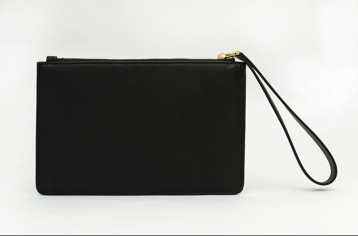 Bold Black Colored Metal Embellished Leather Handbag