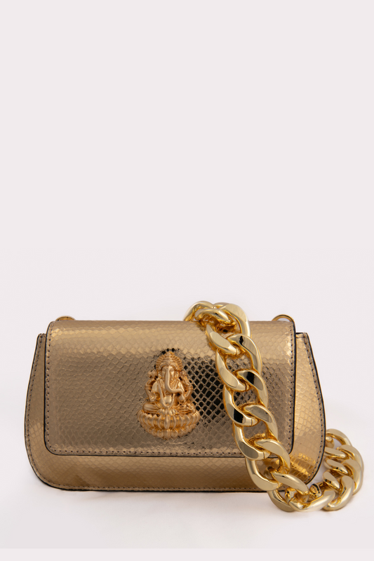 Radiant Gold Haridra Ganpati Carved Clutch