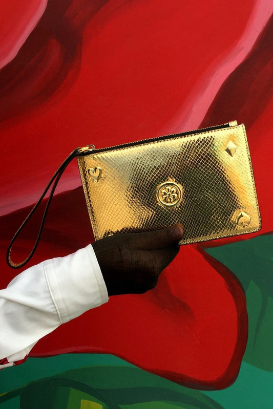 Radiant Gold Textured And Metal Embellishment Leather Handbag