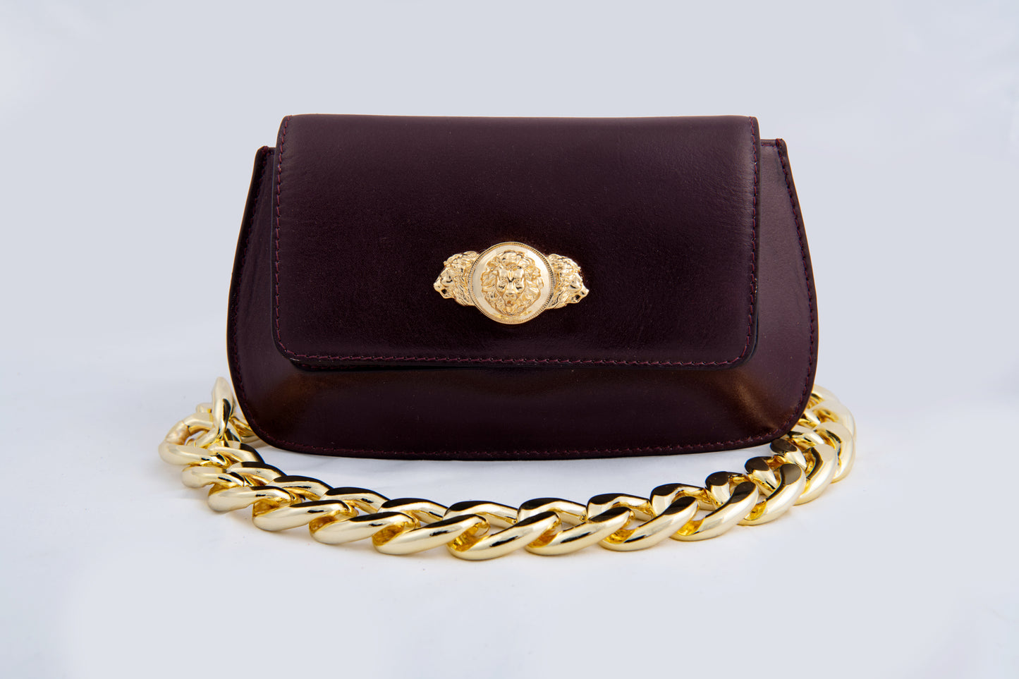 Bold Metal Embellishment Elite Wine Leather Clutch