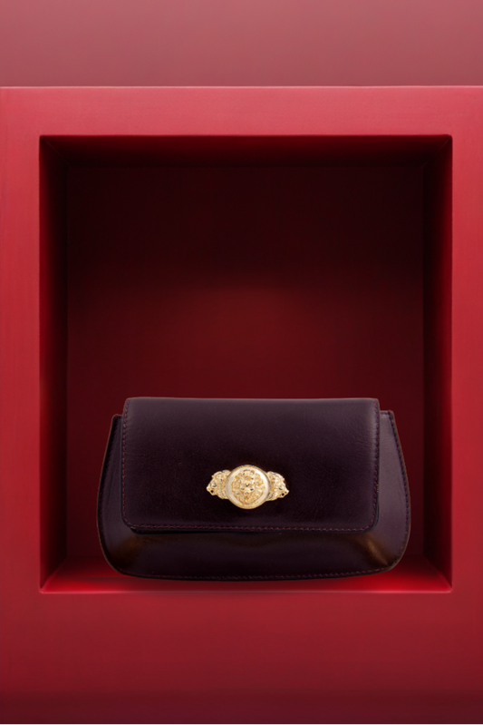Bold Metal Embellishment Elite Wine Leather Clutch