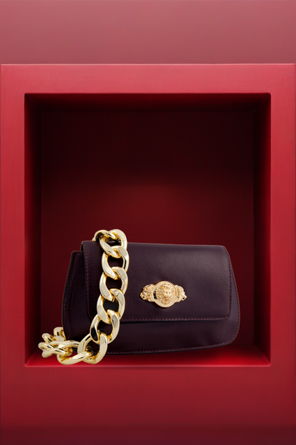 Bold Metal Embellishment Elite Wine Leather Clutch