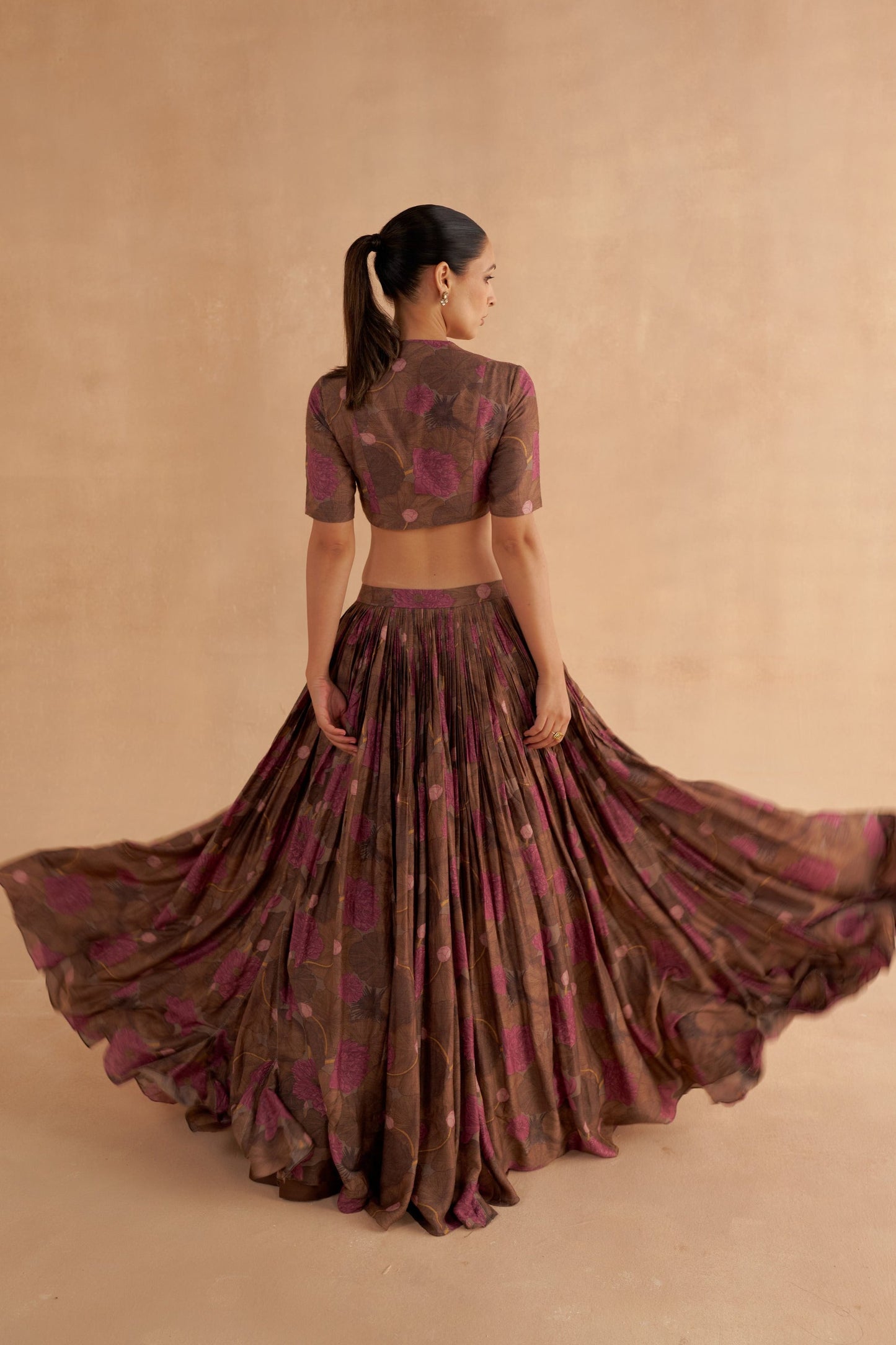 Zardozi Embroidery Paired with Brown Silk Blouse and Lotus Printed Lehenga