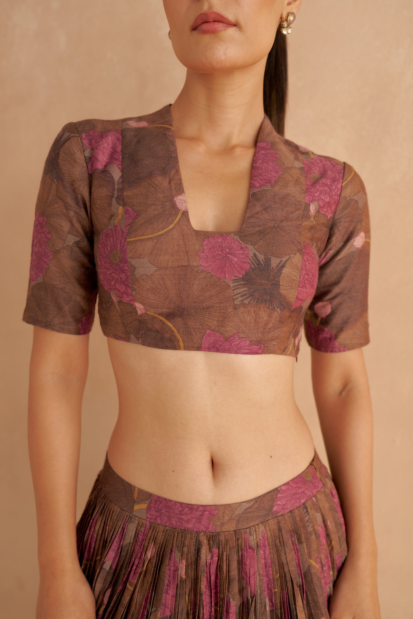 Zardozi Embroidery Paired with Brown Silk Blouse and Lotus Printed Lehenga