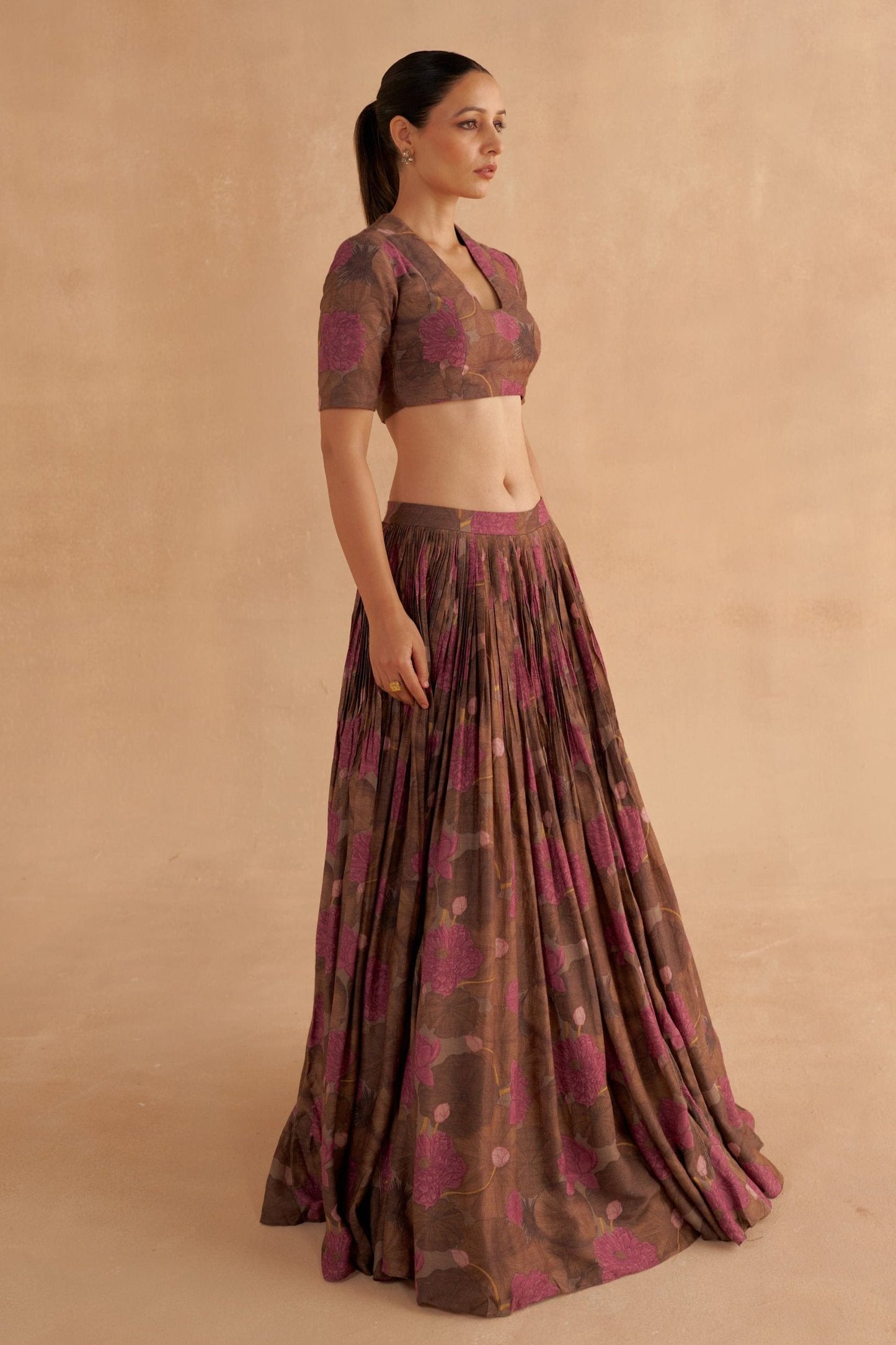 Zardozi Embroidery Paired with Brown Silk Blouse and Lotus Printed Lehenga